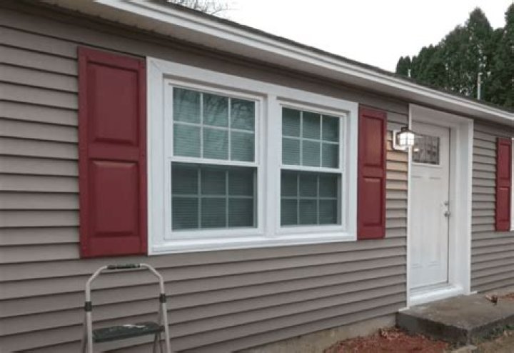Can you put wood shutters on vinyl siding?