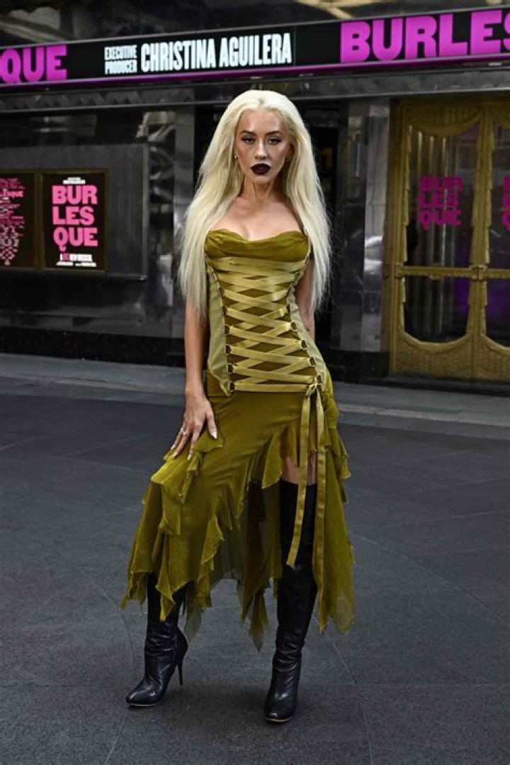 Christina Aguilera in a flattering gown at the AMAs: too orange, but improved?