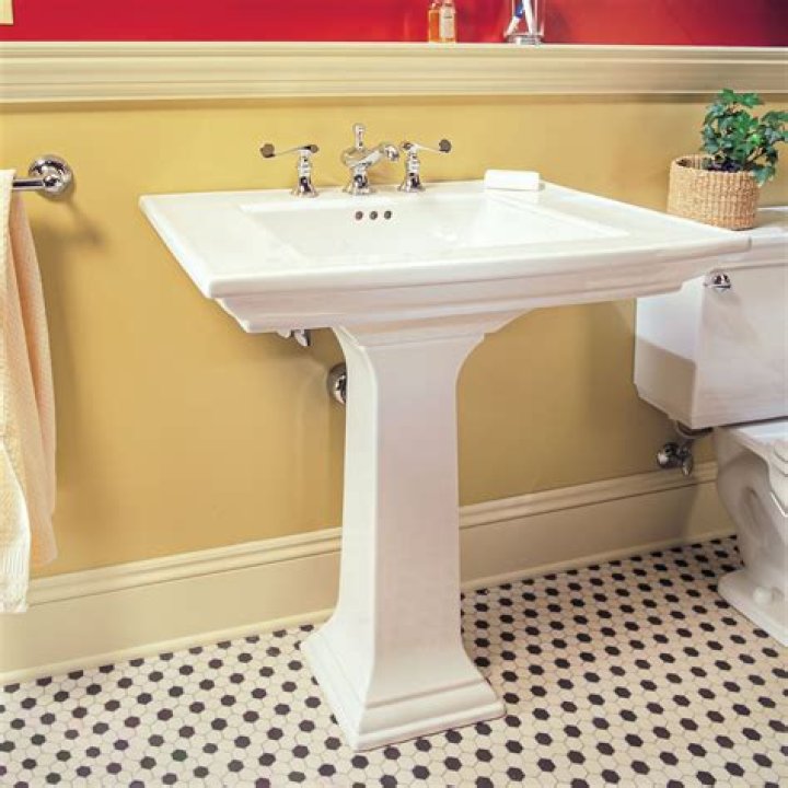 How do you remove and install a pedestal sink?