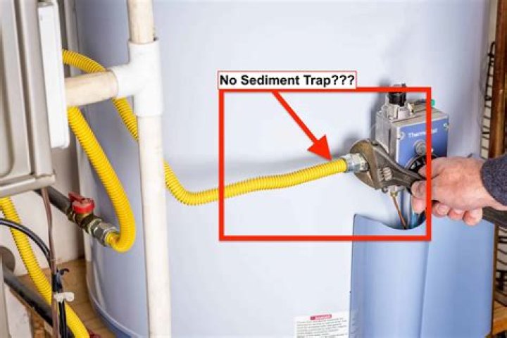 What is a sediment trap for a hot water heater?