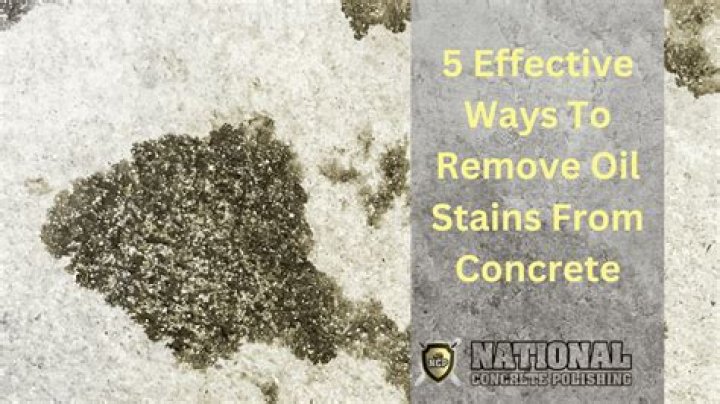 What soaks up oil from concrete?